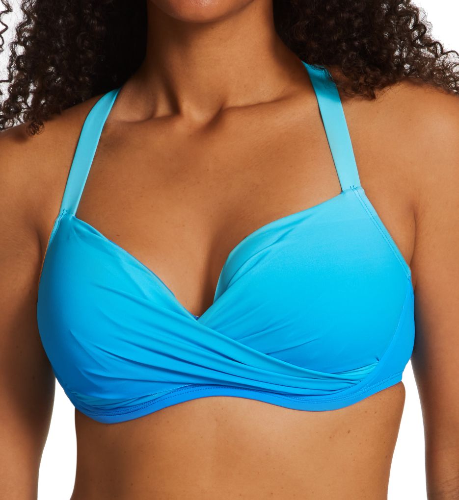 SPANX - Our Workout to Waves Bra does it all. Wear it as a swim